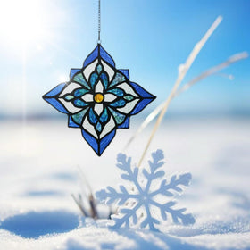 Sunlight through Karhuimoyi blue flower glass brightens the room