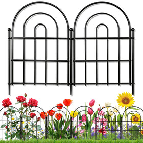 Karlliu decorative garden fence with an arch design marks garden borders