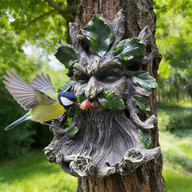 KARSTSYLVA whimsical forest spirit sculpture with green leaf features