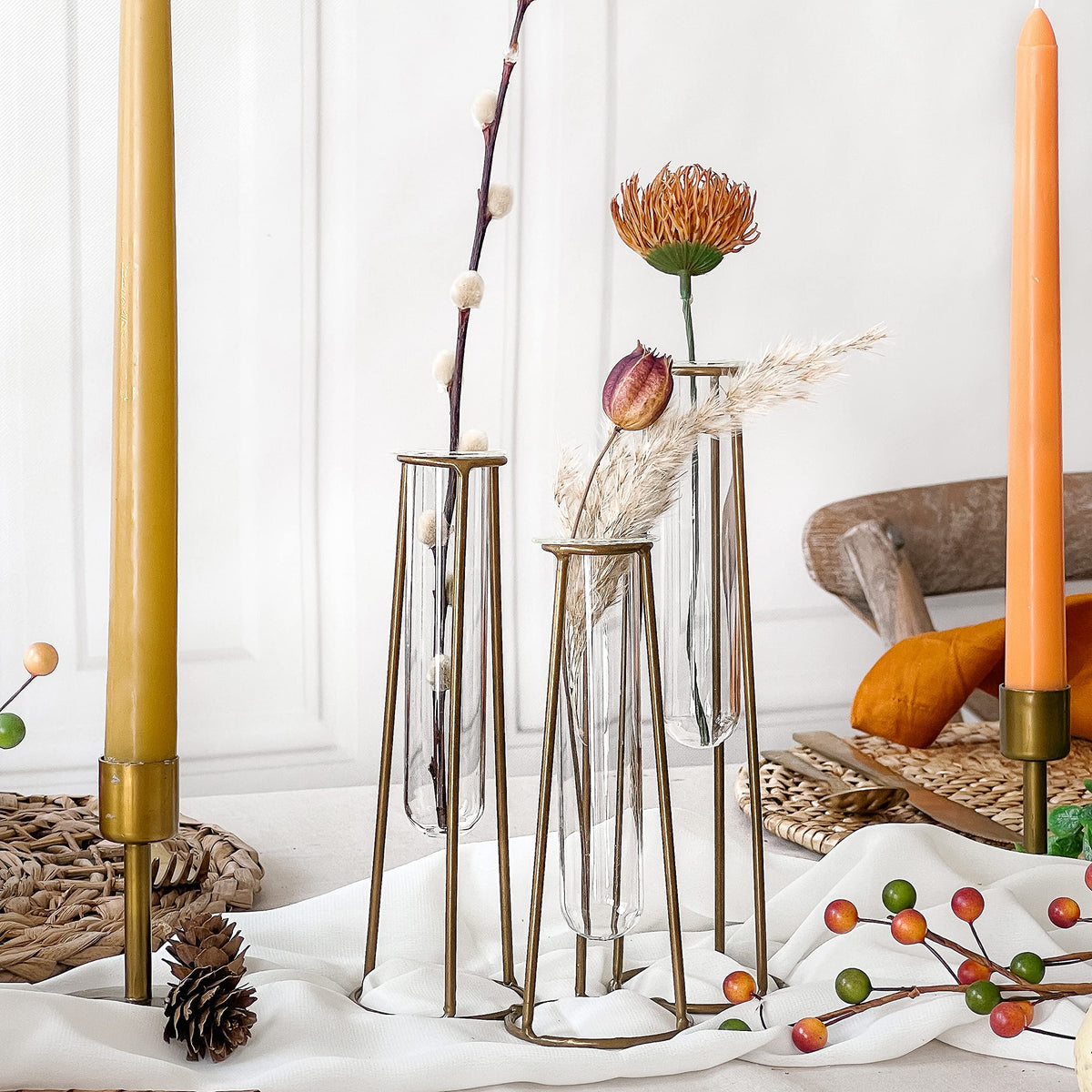 Kate Aspen display of cut flowers in glass vases for versatile decor.