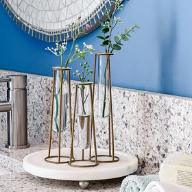 Kate Aspen gold metal base stand offers durable, elevated display for clippings and blooms.