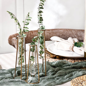 Kate Aspen tabletop centerpiece with three-tube arrangement for stylish shelves.