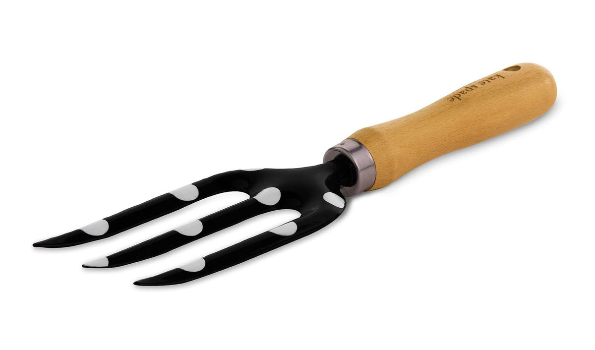 Kate Spade New York hand rake with dot pattern for soil care.