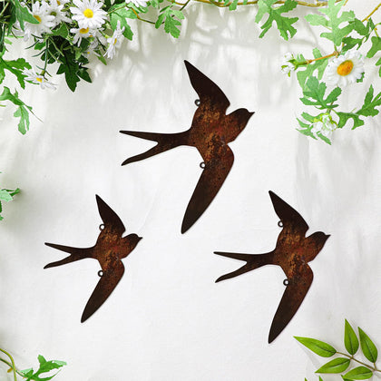 Kathfly rusty birds wall art in flight adds rustic charm to fences.