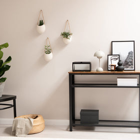 Compact dimensions of Kazai Ellie planters fit narrow walls and corners