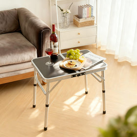 Kcmploro folding picnic table with adjustable legs, three height options for comfort.