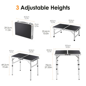 Kcmploro folding picnic table folded compactly for easy transport and storage.