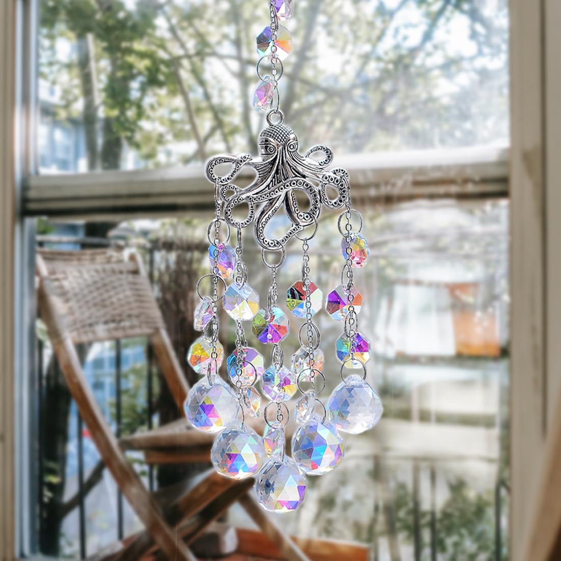 KEINIA window suncatcher casting rainbow reflections on walls