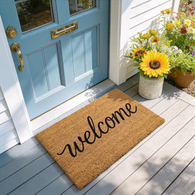 Kelarea door mat doubles as a welcoming outdoor rug for porches.