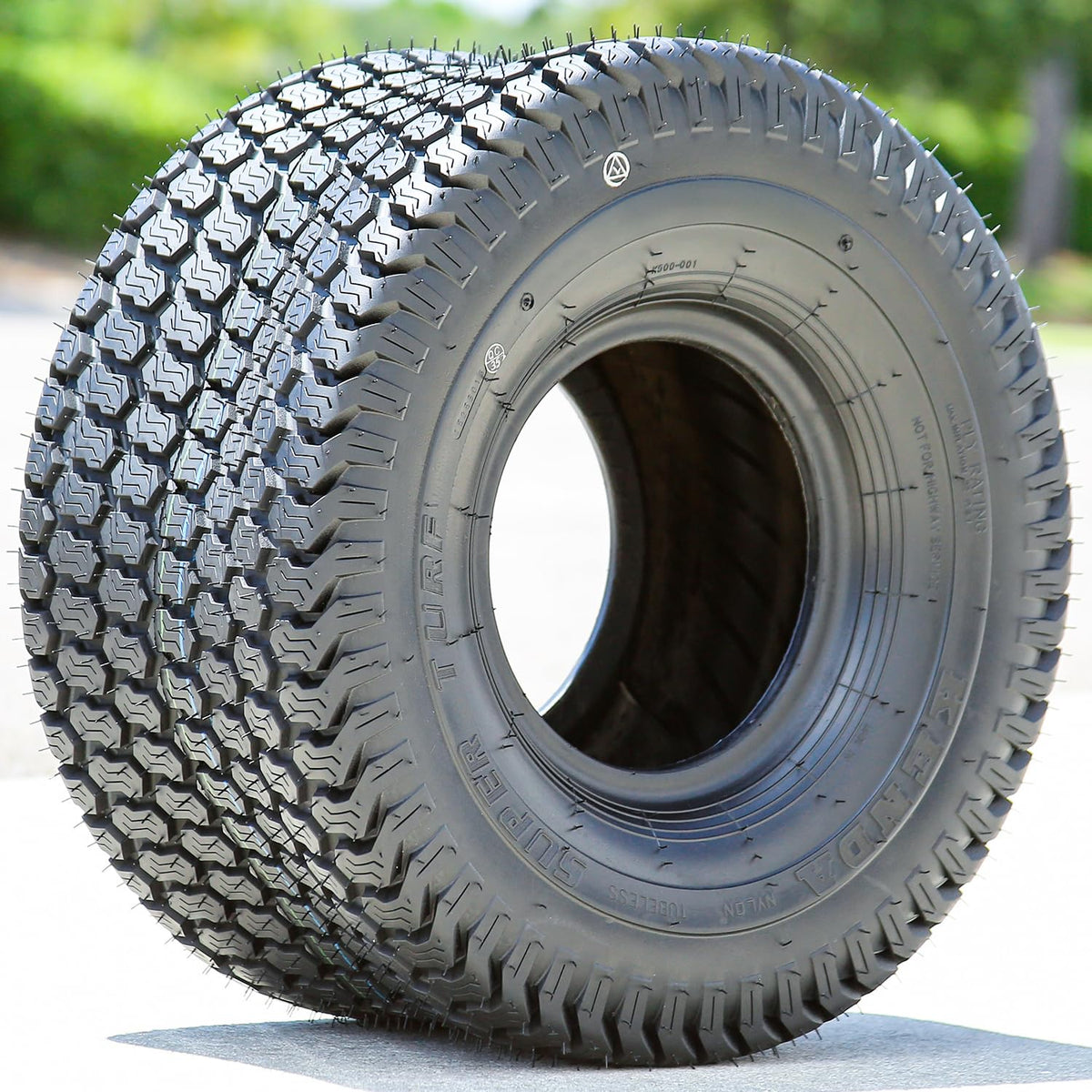 Kenda K500 Super Turf mounted on a mower demonstrates OEM fitment for easy replacement