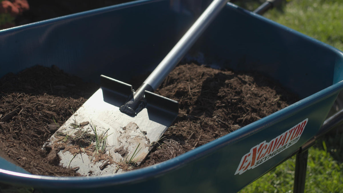 Kenyon S550 wide head enables stable trench width for irrigation tubing.