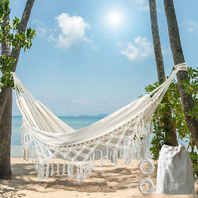 KEREITH handwoven fringe hammock for stylish indoor/outdoor decor.