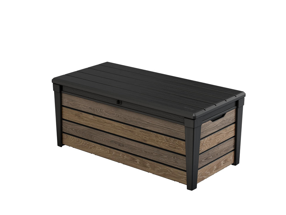 Keter Signature Collection deck box with wood-look finish stores outdoor items neatly.