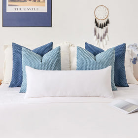 Kevin Textile dry on low heat to restore fluff and fullness.