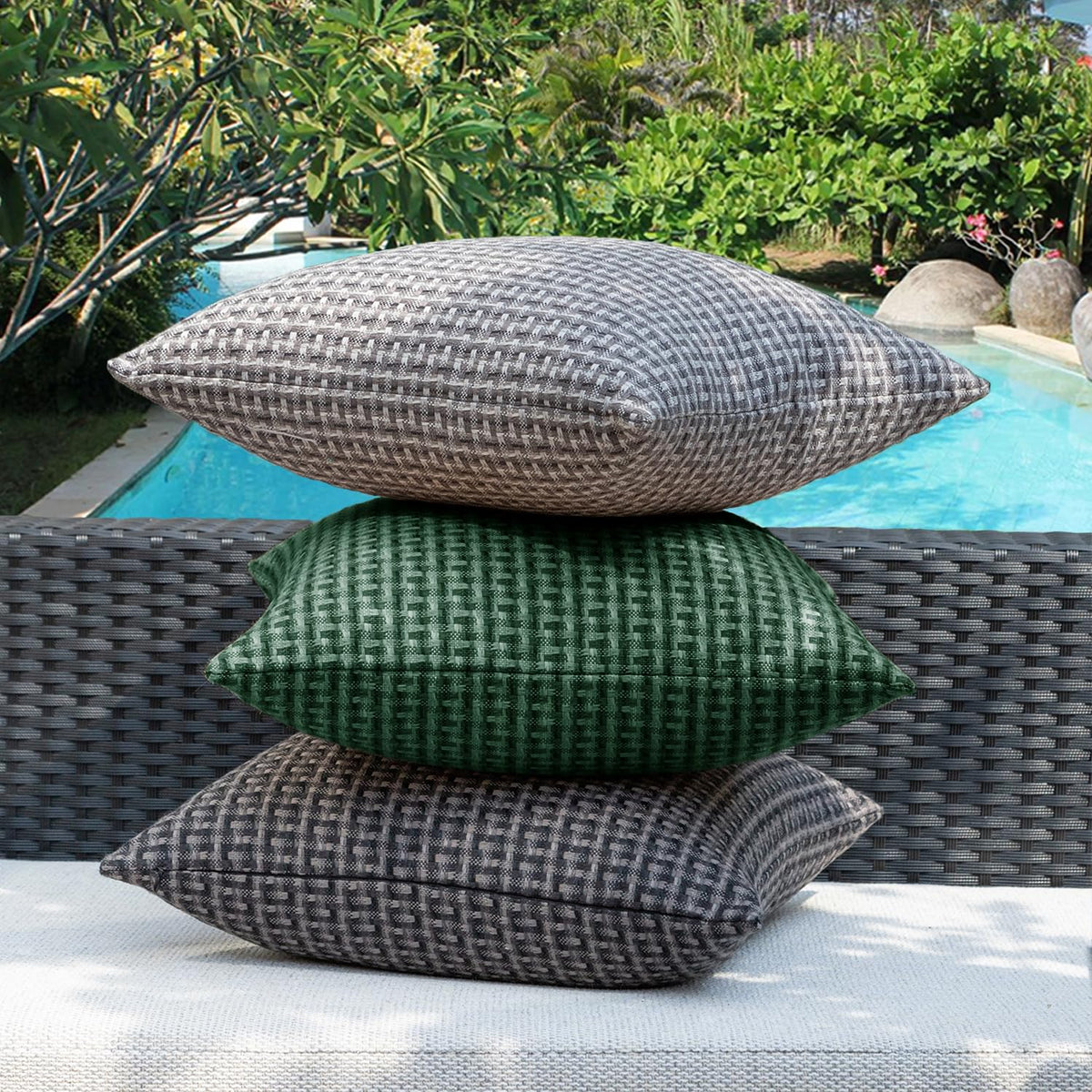 Kevin Textile dark green shade blends with outdoor seating.