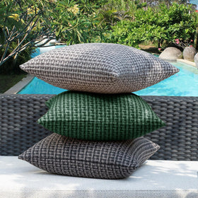 Kevin Textile dark green shade blends with outdoor seating.