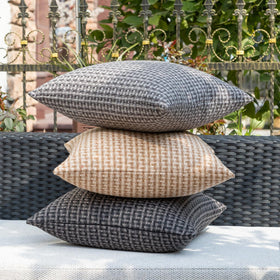 Kevin Textile outdoor pillow cover on a patio chair.