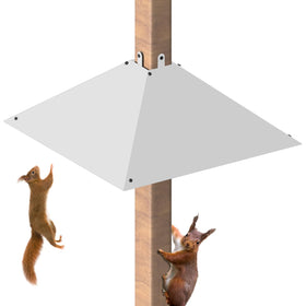 Khordin metal squirrel baffle on a 4x4 post protecting backyard feeders