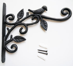 KiaoTime hand-forged iron bracket on a fence post ready for garden hanging.