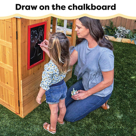 KidKraft Backyard scene shows kids playing at the modern playhouse.