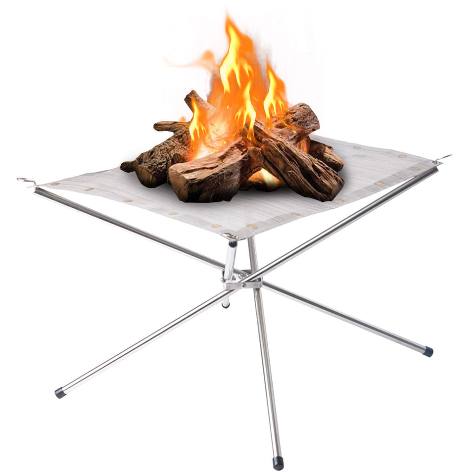 Kikerike portable fire pit assembled on campsite for cozy warmth.