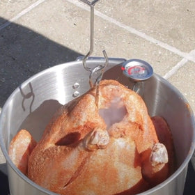 King Kooker turkey rack and lifting hook for easy handling.
