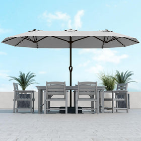 Kingdura 15ft umbrella with LED-lit ribs providing ambient evening lighting