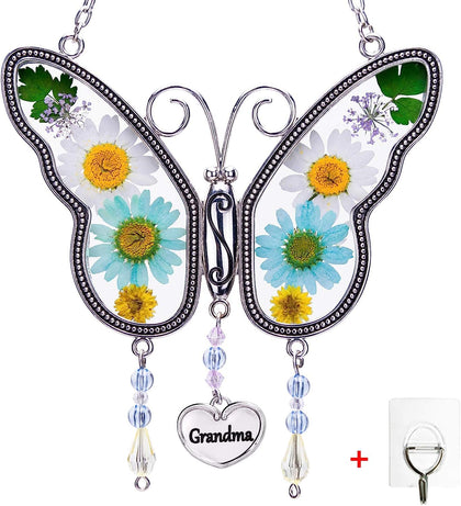 Kingtto Mother's Day suncatcher butterfly wings with real flowers brightening a window