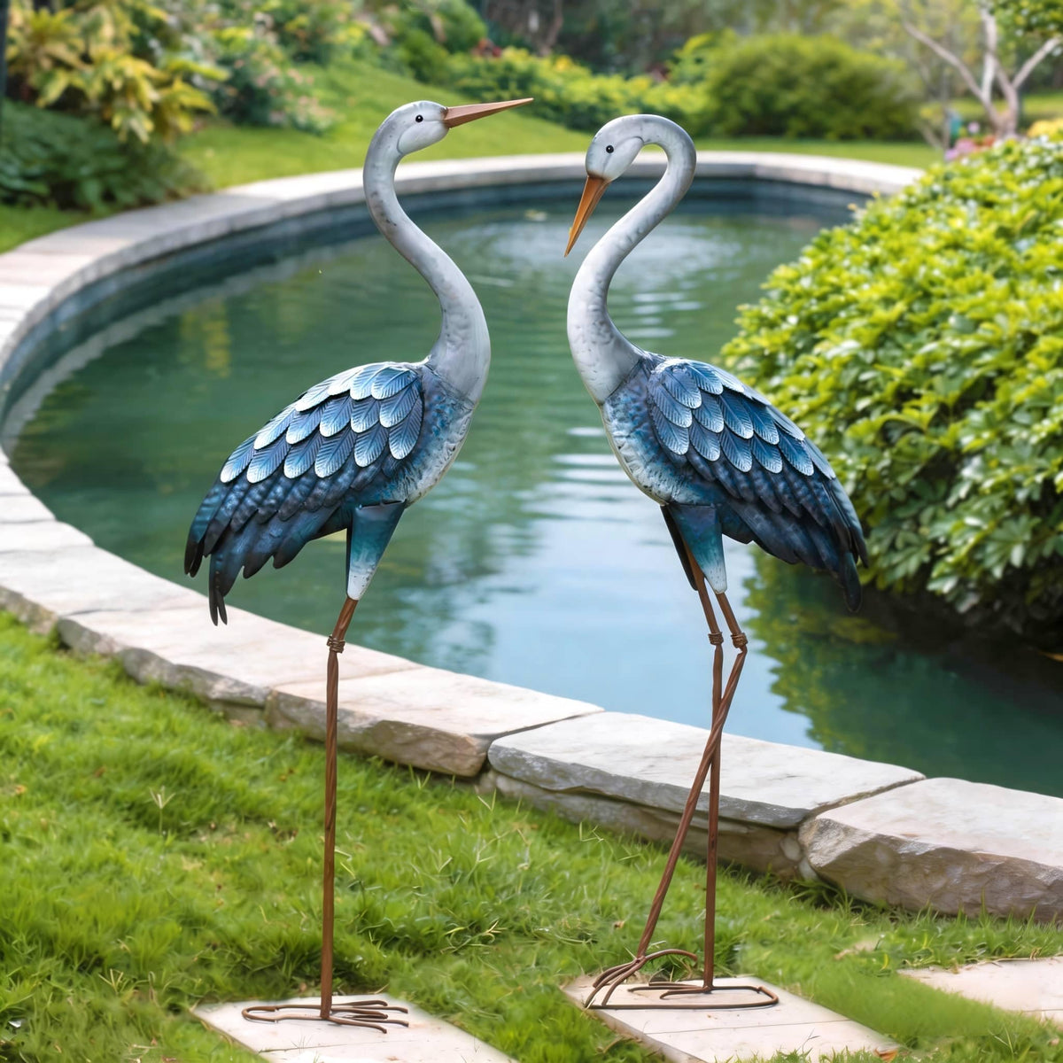 Kircust blue heron statue outdoor-pair view enhances pondside décor with lifelike charm.