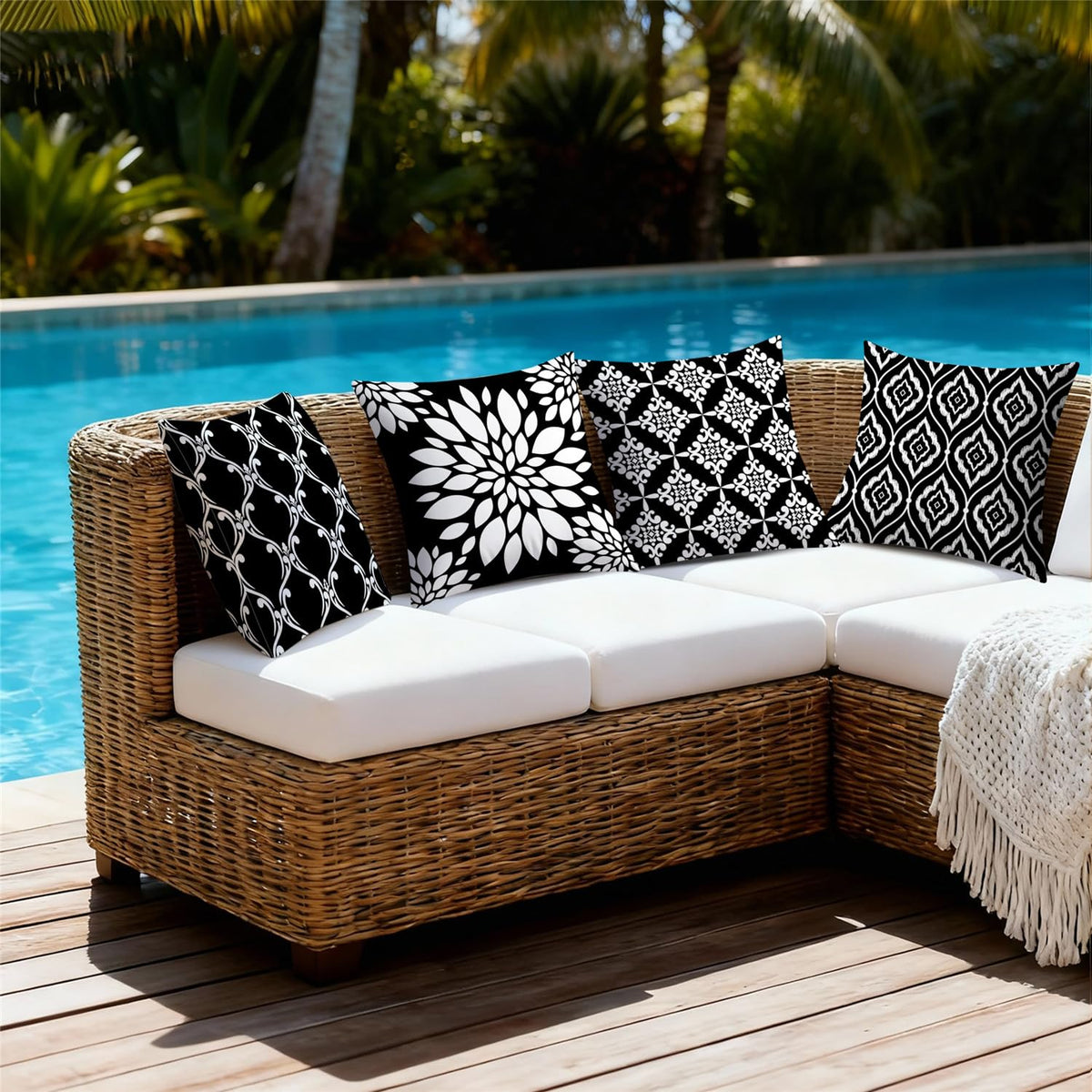 KISVODS garden porch setup featuring four black outdoor cushion covers on furniture.