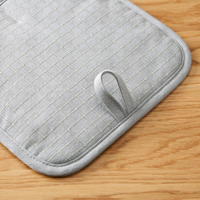 Close-up of KitchenAid Gridlines Pot Holder cotton shell and thick padding.