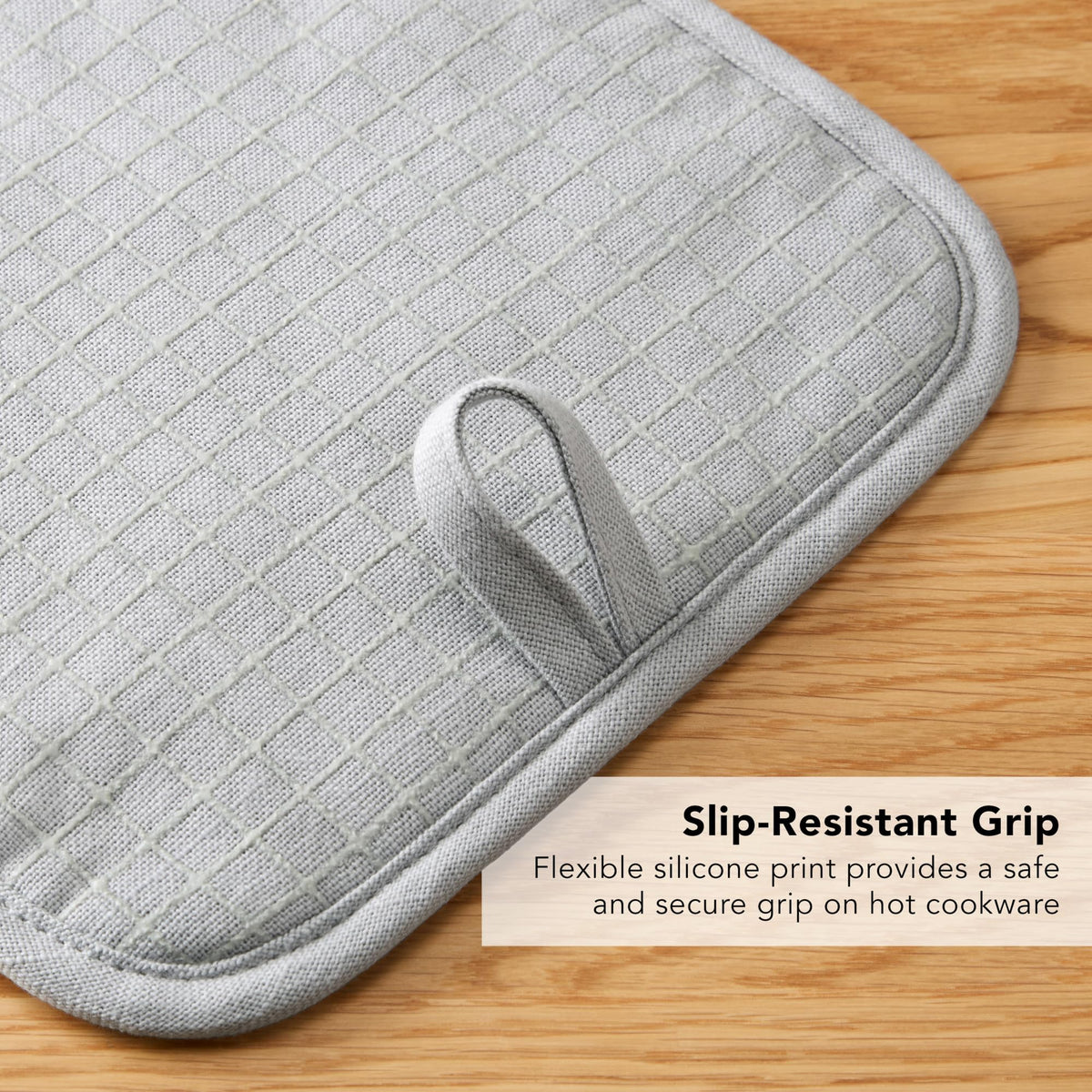 Machine washable KitchenAid Gridlines Pot Holder for simple cleaning.