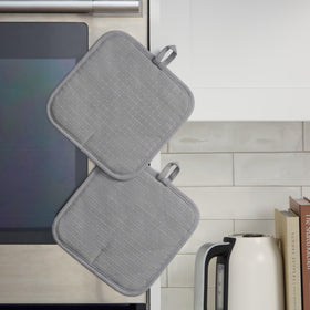 Magnetic cuff and hanging loop on KitchenAid Gridlines Pot Holder for easy storage.