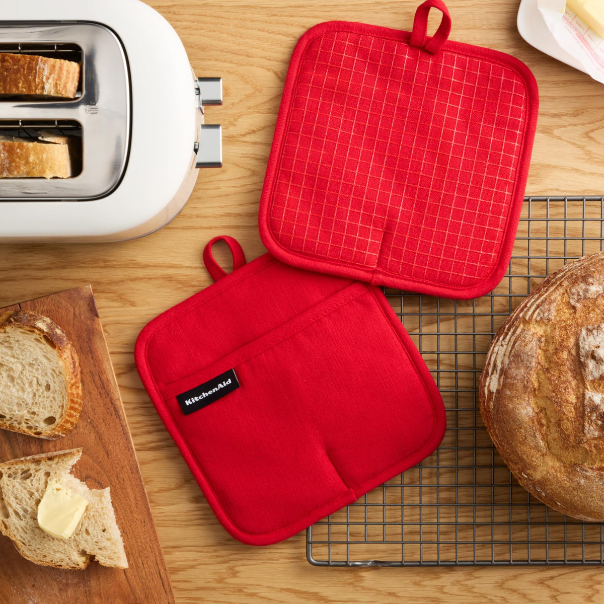 KitchenAid Gridlines potholder shows slip-resistant silicone grip for secure pan handling