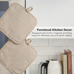 KitchenAid machine-washable pot holders for easy cleaning after cooking.