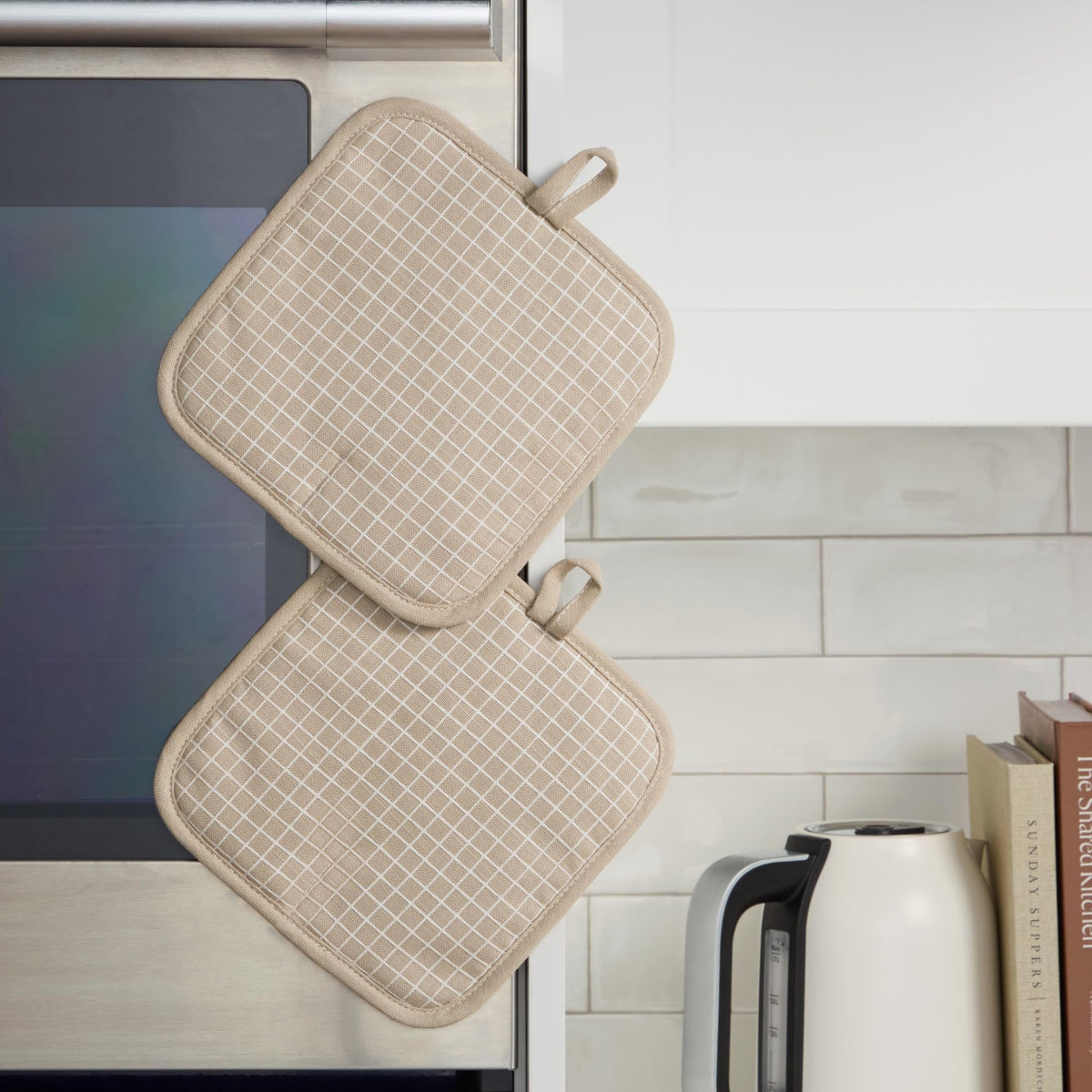 KitchenAid magnetic cuff and hanging loops for easy storage near the stove.