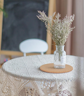 KITLAB cork plant coasters cleaning image demonstrates easy wipe-clean care.