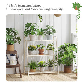 Kitsanery heavy-duty stand on balcony supports multiple plant pots.
