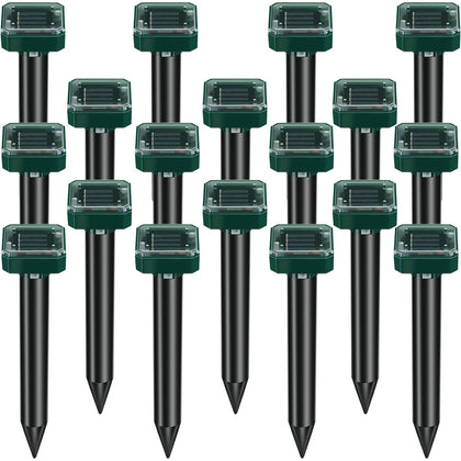 Kittmip mole repellent stake deters moles in a sunlit lawn
