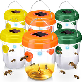 Kittmip orange solar wasp trap with dual entrances for outdoor use.