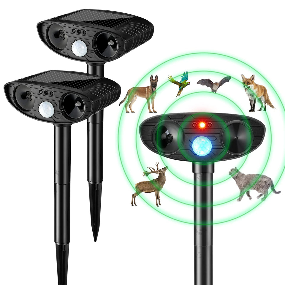 Kittmip ultrasonic animal repeller in outdoor setup deterring pets and wildlife