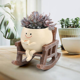KIUGCO Smily Face Planter on a tabletop for decor