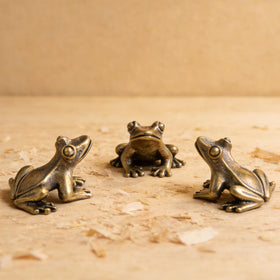 KKBES gold brass frog figurine close-up detailing tiny features and premium construction.