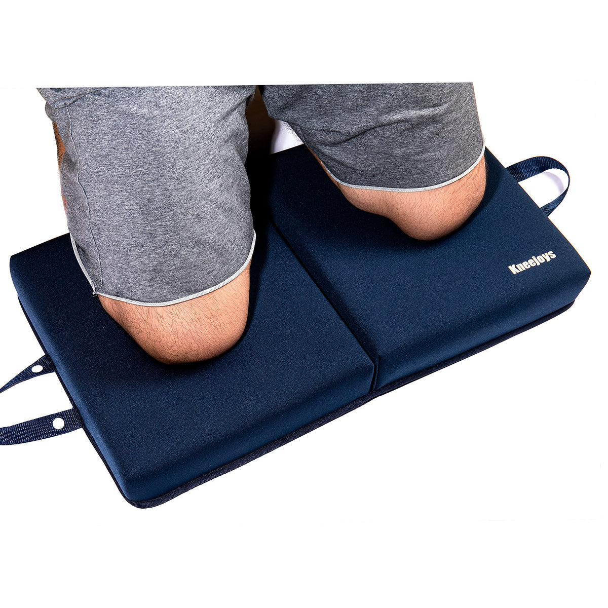 Kneejoys extra-thick knee pad folded with handle for easy transport.