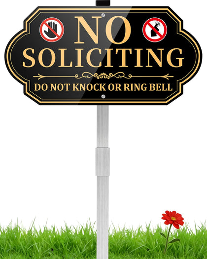 Koalaat no soliciting sign in front yard with bold letters communicates privacy boundaries.