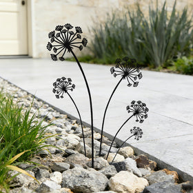 KODIBO dandelion stake outdoors enhances garden silhouette