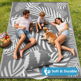 Kohree rug easy setup with corner loops and stakes for wind resistance.