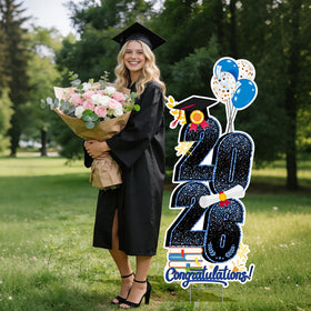 KOITHE yard sign creates a festive graduation backdrop for photos.
