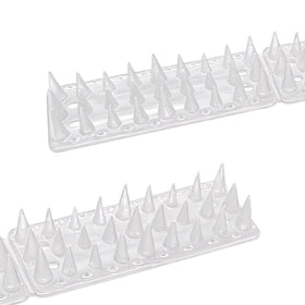 KOKMEYA Bird Spikes on a fence deter pigeons while keeping outdoor areas clean.
