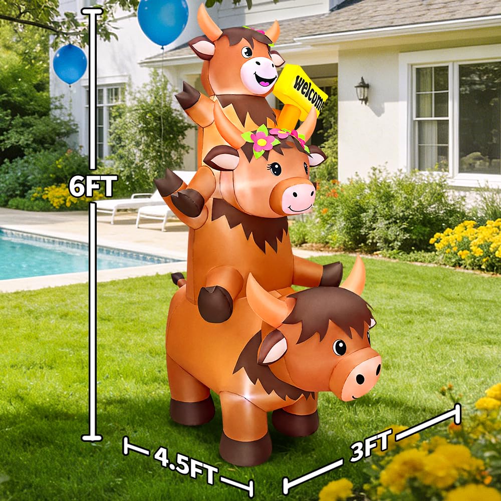 KOOY Highland Cow inflatable anchored with stakes for secure outdoor display